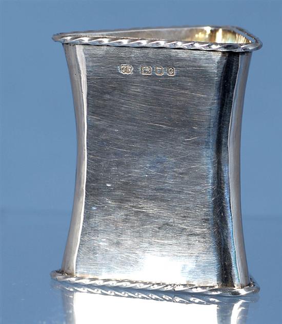 A 1930s Arts & Crafts silver waisted triangular napkin ring, by Omar Ramsden, Height 58mm weight 1.8oz/57grms